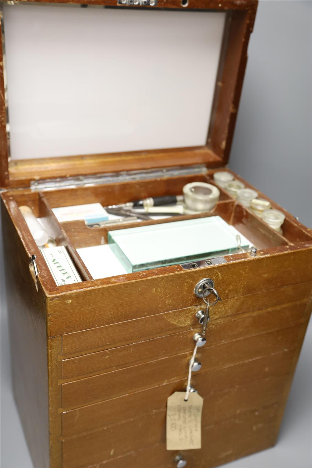 An early 20th century dentistry cabinet and tools